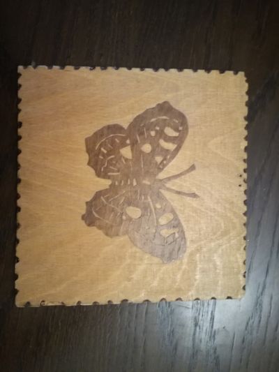 Dřevěný obrázek motýla