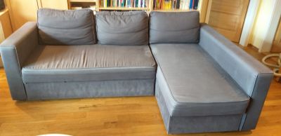 Trojmístná pohovka IKEA modrá čalouněná, rozkládací.