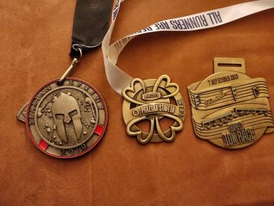 Medaily - kratší závody