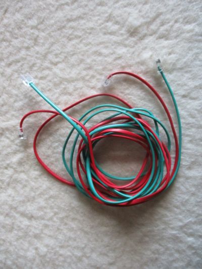 Propojovací kabely červený a zelený