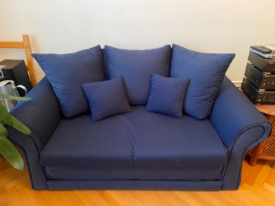 Modrá zánovní sedačka