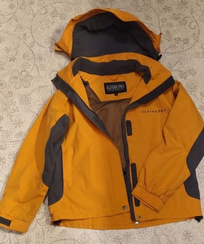 Oranžovošedivá bunda Alpine Pro unisex jarní a podzimní