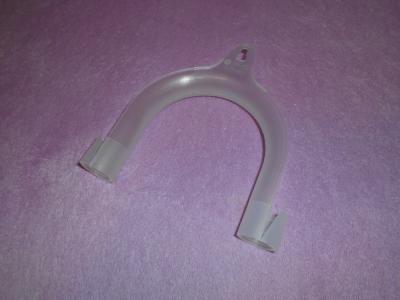 Držák na hadici od pračky