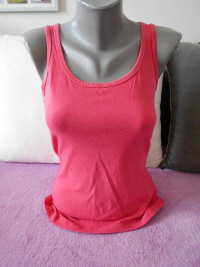 Tílko růžové elastické  .