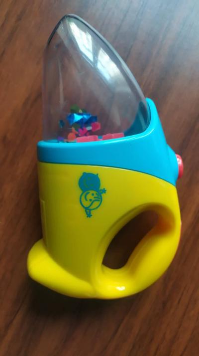 Ruční velmi hezký hýbací se jakoby vysavač pro malé děti