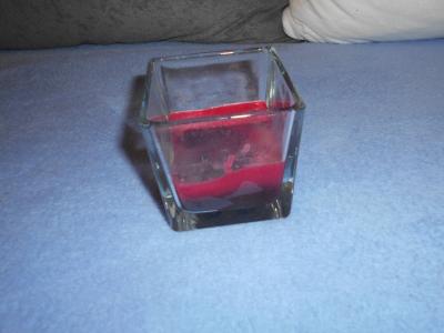 Zbytek svíčky ve skle