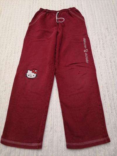 dívčí tepláky vel. 140