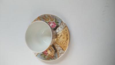 Porcelánový hrníček na čaj s podšálkem