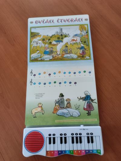 Detska kniha s mini klavirkem