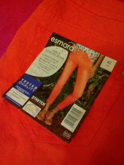 Nové oranž kalhoty Vel. 42