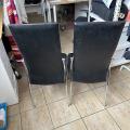 Černé koženkové židle