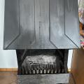Krbová kamna, kombinace litiny a plechu.