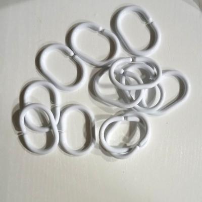 Bílé háčky na závěz