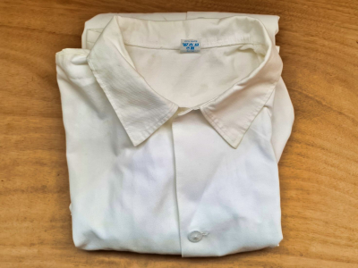 Bílý pracovní plášť