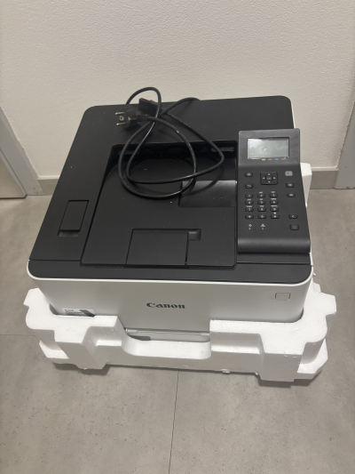 Laserovou bar  tiskarnu .Canon. Je treba vycistit valec