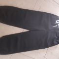 Cerne kalhoty 34