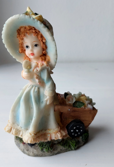 Dekorace květinářka s vozíkem