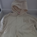 Kabátek s kapucí velikost.68