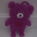 Fialový svítící a blikací medvídek.