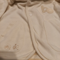 Dětský krémový kabátek vel.68