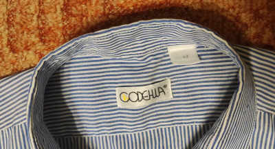 Velkou pánskou košili s krátkým rukávem.