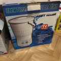 Elektrická ruční pračka v krabici