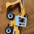Bagr, mechanicky pohyblivy, nabira, jezdi