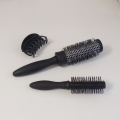 2 kartáče na vlasy a skřipec