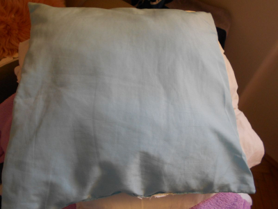 Polštářek vetší modrý sypek.