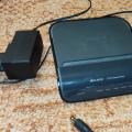 Starý, ale funkční wifi router.