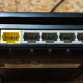 Starý, ale funkční wifi router.