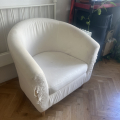 Arm chair Scratched by cat in front.