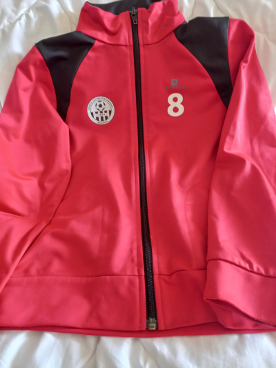 Bunda červená Decatlon 133-142 cm