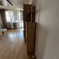 Kombinovaná obývací/šatní stěna