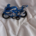 Motorka modrá s číslem 199