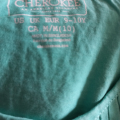 Zelené šatičky s korálky Cherokee vel. 9-10 let