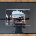 Čtyři zasklené fotografie