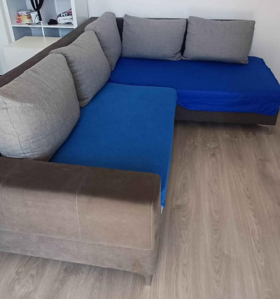 Rohová rozkládací sedačka s úložným prostorem