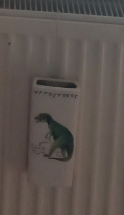 Odpařovač na topení s dinosaurem