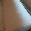 Bílá rohová rozkládací sedačka - koženka