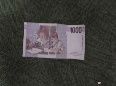 Bankovku 1000 Lir 